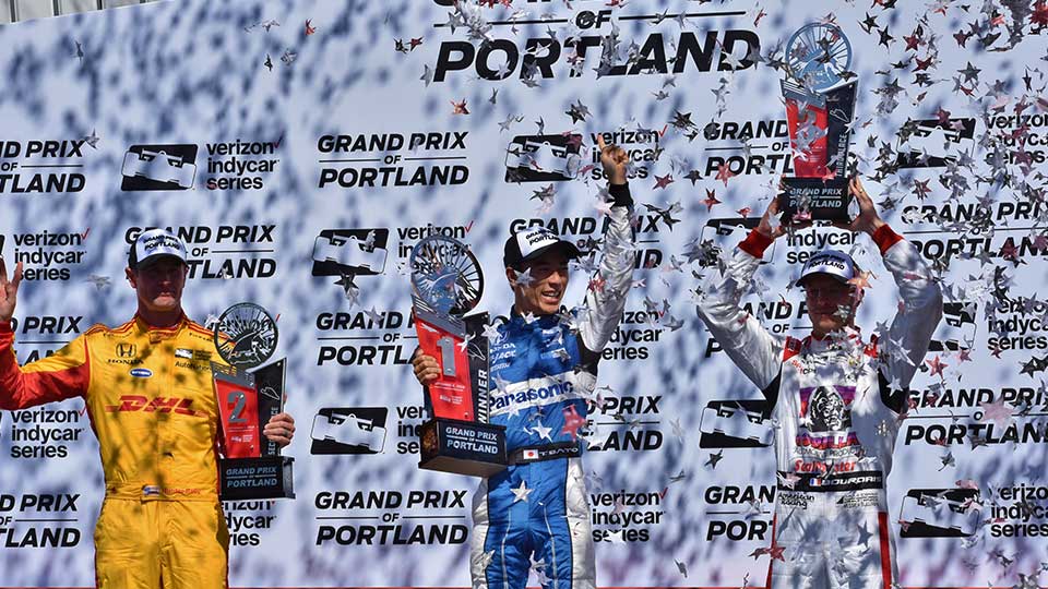 Takuma Sato on the podium at the Grand Prix of Portland